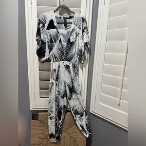 Norma Kamali great condition 
Black and White Palm Print Jumpsuit